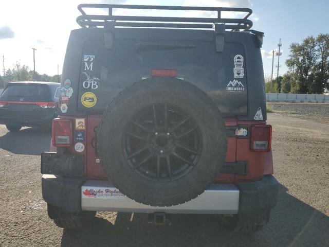 1J4BA5H17BL593450 - 2011 JEEP WRANGLER U SAHARA წითელი ფოტო 6