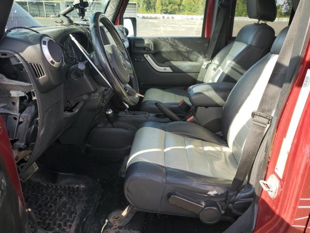 1J4BA5H17BL593450 - 2011 JEEP WRANGLER U SAHARA წითელი ფოტო 7