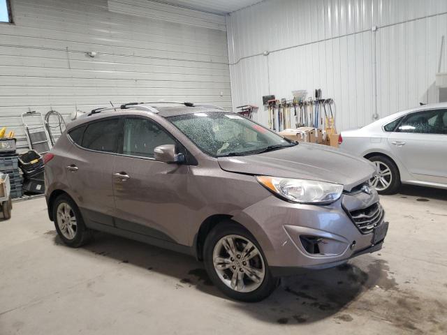 KM8JU3AC0CU387287 - 2012 HYUNDAI TUCSON GLS GRAY photo 4