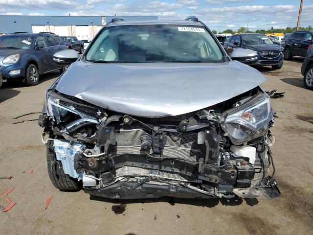 JTMRJREV5JD199022 - 2018 TOYOTA RAV4 HV LE Серебристый фото 5