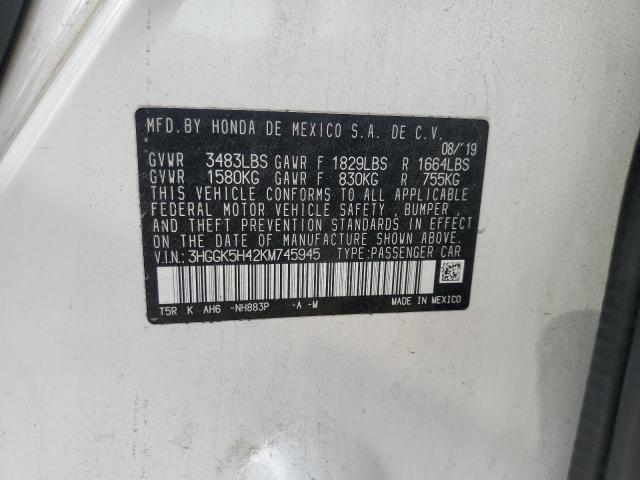 3HGGK5H42KM745945 - 2019 HONDA FIT LX WHITE photo 13