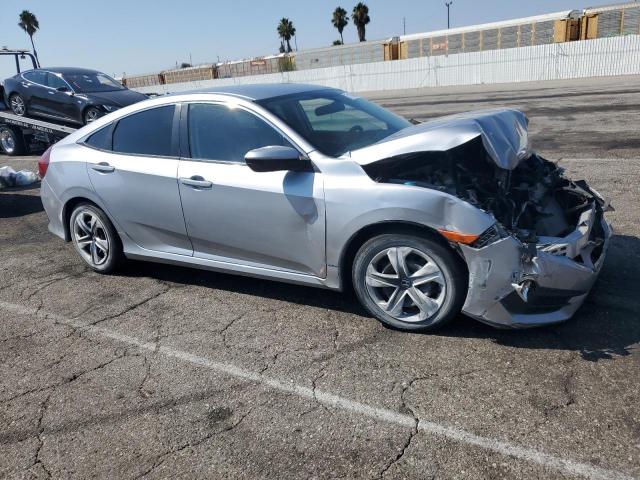 2HGFC2F55JH554732 - 2018 HONDA CIVIC LX ვერცხლისფერი ფოტო 4