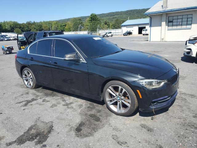 WBA8D9G55JNU70412 - 2018 BMW 330 XI BLACK photo 4