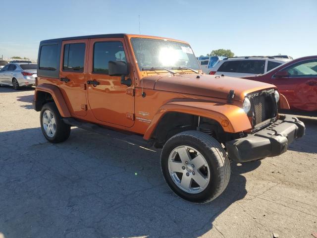 1J4BA5H16BL619942 - 2011 JEEP WRANGLER U SAHARA ORANGE photo 4