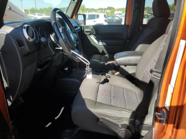 1J4BA5H16BL619942 - 2011 JEEP WRANGLER U SAHARA ORANGE photo 7