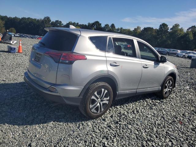 2T3ZFREV0HW384982 - 2017 TOYOTA RAV4 LE Күміс фото 3