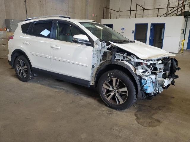 JTMWFREV4GJ064029 - 2016 TOYOTA RAV4 XLE WHITE photo 4