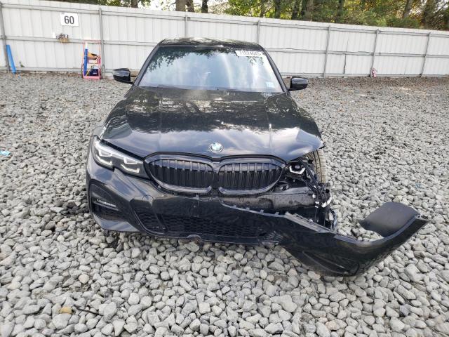 3MW5R7J03N8C55240 - 2022 BMW 330XI BLACK photo 5