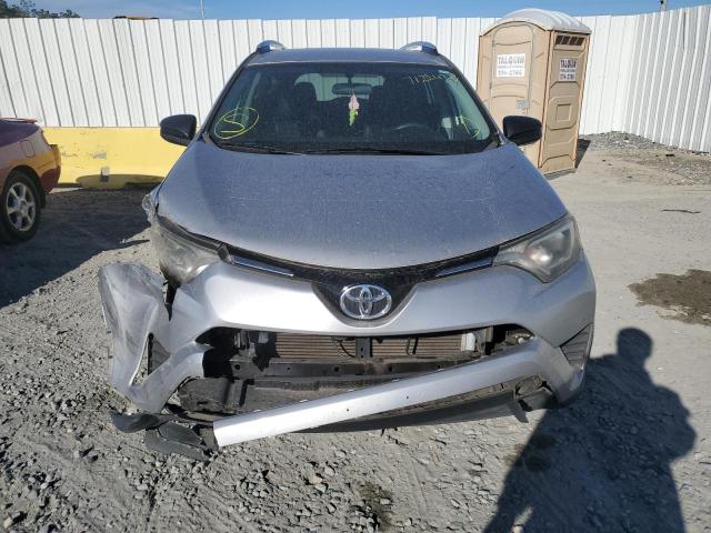 2T3ZFREV7GW263428 - 2016 TOYOTA RAV4 LE SILVER photo 5