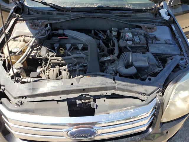 3FAFP07ZX6R193265 - 2006 FORD FUSION SE BLACK photo 11