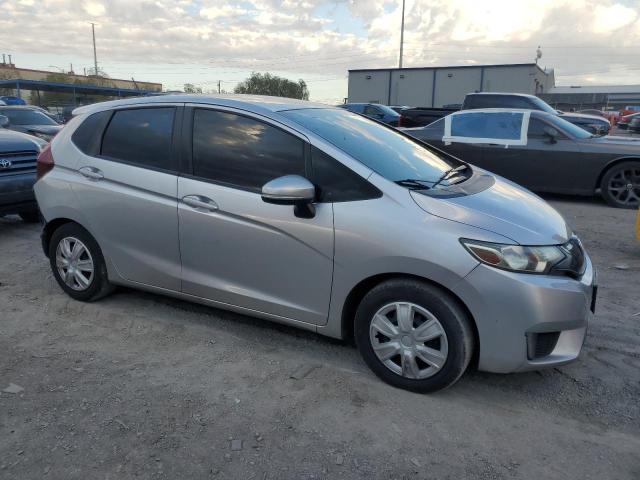 JHMGK5H54GX011475 - 2016 HONDA FIT LX SILVER photo 4
