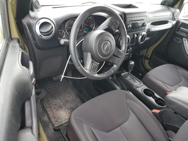 1C4AJWBG8DL604706 - 2013 JEEP WRANGLER SAHARA Grün Foto 8