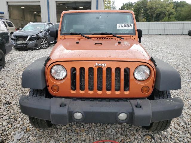 1J4AA2D12AL225577 - 2010 JEEP WRANGLER SPORT ORANGE photo 5