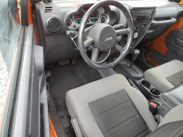 1J4AA2D12AL225577 - 2010 JEEP WRANGLER SPORT ORANGE photo 8