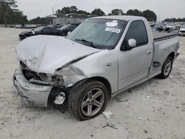 2FTRF073X4CA78662 - 2004 FORD F150 SVT LIGHTNING SILVER photo 1