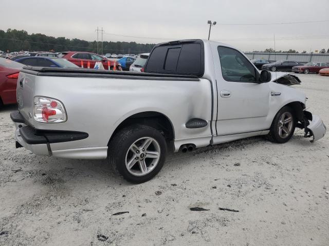 2FTRF073X4CA78662 - 2004 FORD F150 SVT LIGHTNING SILVER photo 3