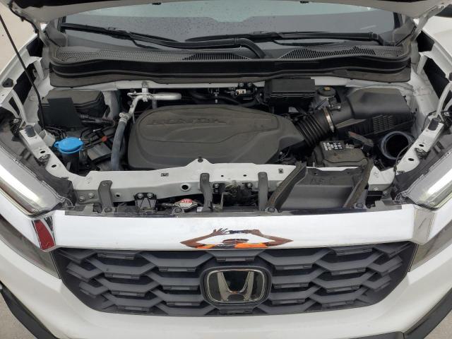 5FNYF8H59PB017522 - 2023 HONDA PASSPORT EXL WHITE photo 12