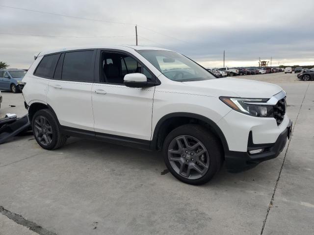 5FNYF8H59PB017522 - 2023 HONDA PASSPORT EXL WHITE photo 4
