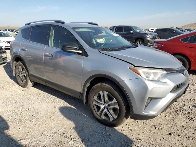JTMBFREV8JJ195843 - 2018 TOYOTA RAV4 LE SILVER photo 4