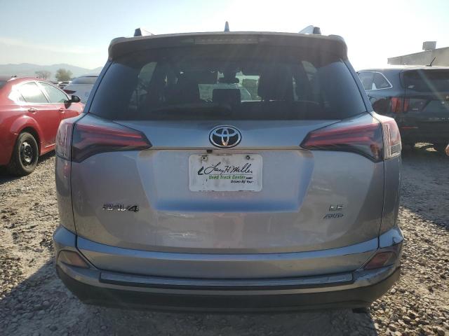 JTMBFREV8JJ195843 - 2018 TOYOTA RAV4 LE SILVER photo 6