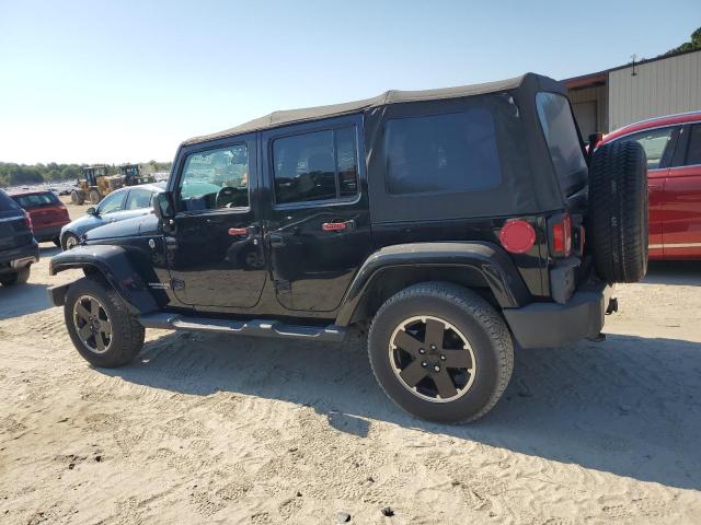 1C4BJWEG3CL280529 - 2012 JEEP WRANGLER U SAHARA შავი ფოტო 2