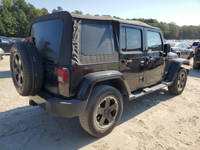 1C4BJWEG3CL280529 - 2012 JEEP WRANGLER U SAHARA შავი ფოტო 3