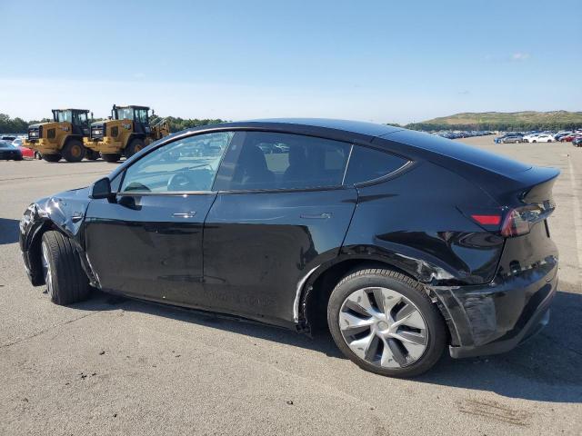 7SAYGDEE8PA184562 - 2023 TESLA MODEL Y Schwarz Foto 2