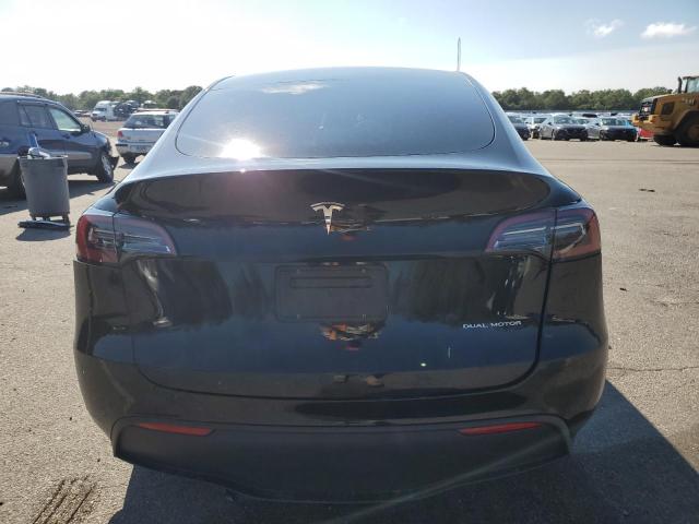7SAYGDEE8PA184562 - 2023 TESLA MODEL Y Schwarz Foto 6