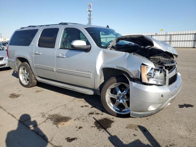 1GNSCJE04BR363924 - 2011 CHEVROLET SUBURBAN C1500 LT SILVER photo 4