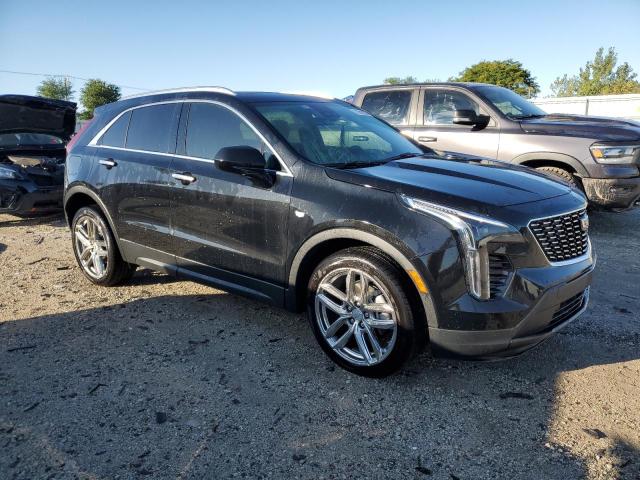 1GYAZAR45NF157477 - 2022 CADILLAC XT4 LUXURY BLACK photo 4