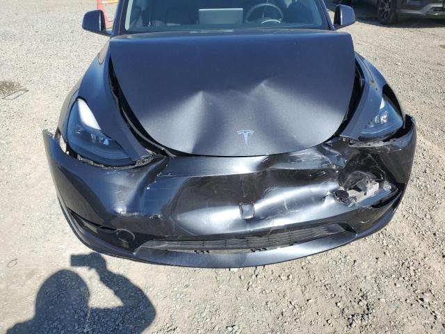 7SAYGAEE8RF033273 - 2024 TESLA MODEL Y შავი ფოტო 12
