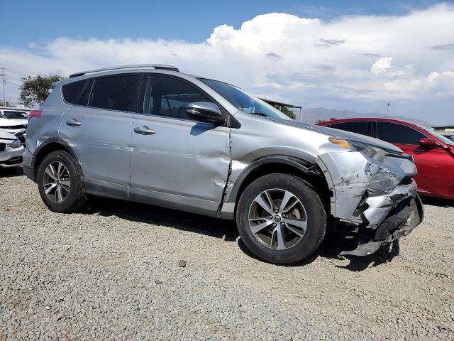 2T3WFREV6GW305736 - 2016 TOYOTA RAV4 XLE SILVER photo 4