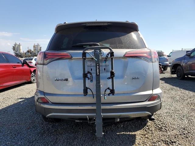 2T3WFREV6GW305736 - 2016 TOYOTA RAV4 XLE SILVER photo 6