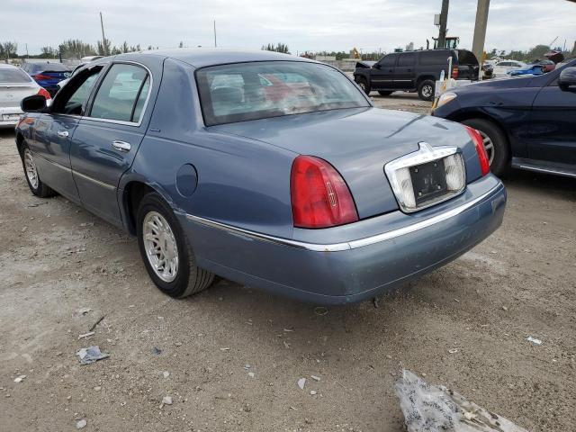 1LNHM82W9XY611496 - 1999 LINCOLN TOWN CAR SIGNATURE BLUE photo 2