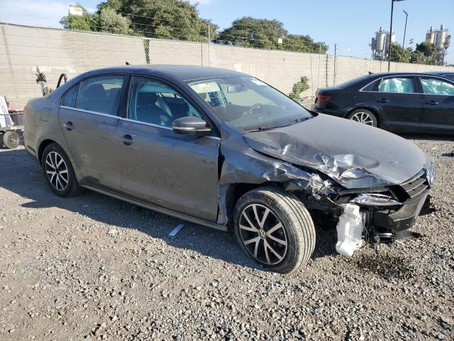 3VWDB7AJ9HM288358 - 2017 VOLKSWAGEN JETTA SE GRAY photo 4