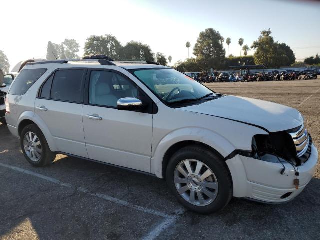 1FMDK03W79GA00282 - 2009 FORD TAURUS X LIMITED WHITE photo 4