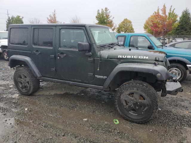 1J4BA6H13BL573816 - 2011 JEEP WRANGLER RUBICON GREEN photo 4