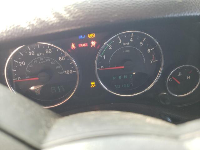 1C4BJWDG3DL675104 - 2013 JEEP WRANGLER UNLIMITED SPORT RED photo 9