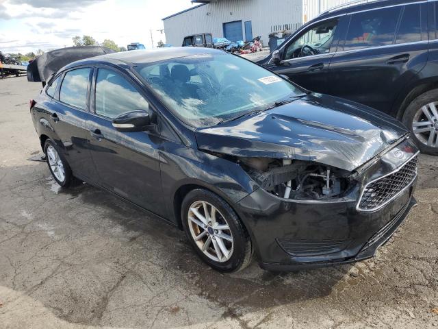 1FADP3F22FL340027 - 2015 FORD FOCUS SE BLACK photo 4