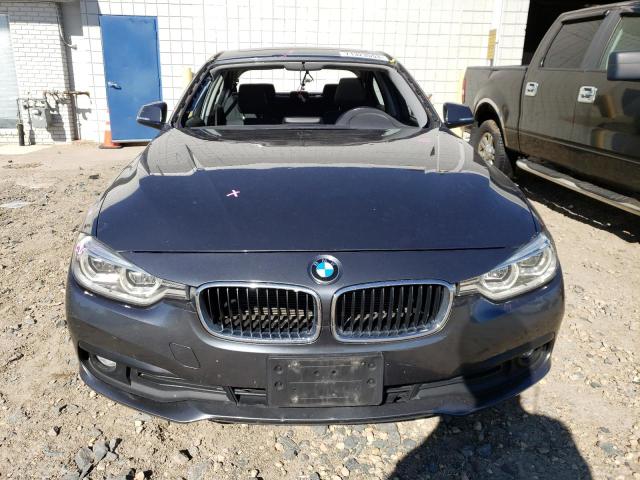 WBA8E5G52JNU47255 - 2018 BMW 320 XI GRAY photo 5