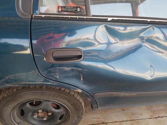 1Y1SK528X2Z413007 - 2002 CHEVROLET GEO PRIZM BASE BLUE photo 9