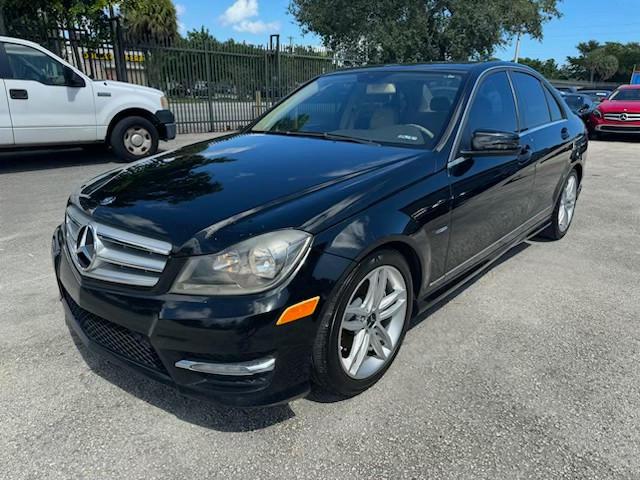 WDDGF4HB0CA644127 - 2012 MERCEDES-BENZ C 250 BLACK photo 1