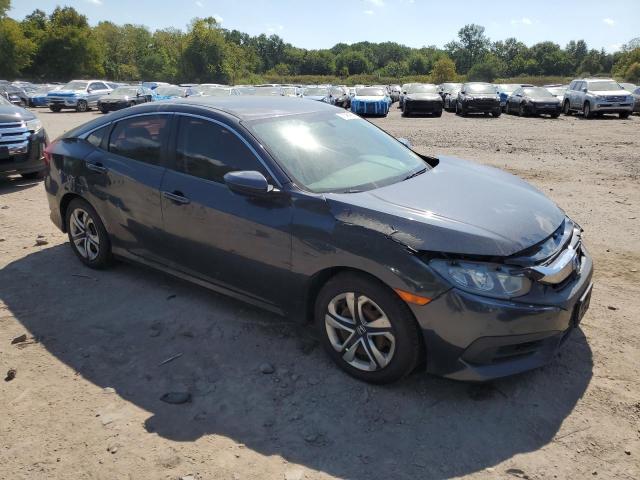 2HGFC2F57JH500977 - 2018 HONDA CIVIC LX ლურჯი ფოტო 4