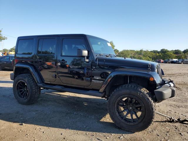 1C4BJWEG0EL277994 - 2014 JEEP WRANGLER U SAHARA BLACK photo 4