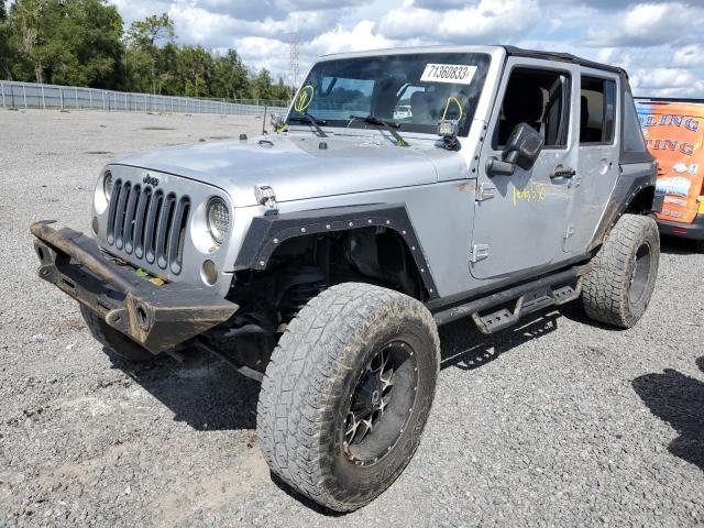 1J4GA59167L142179 - 2007 JEEP WRANGLER SAHARA GRAY photo 1