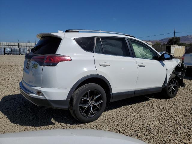 JTMNFREV5JJ723433 - 2018 TOYOTA RAV4 SE WHITE photo 3