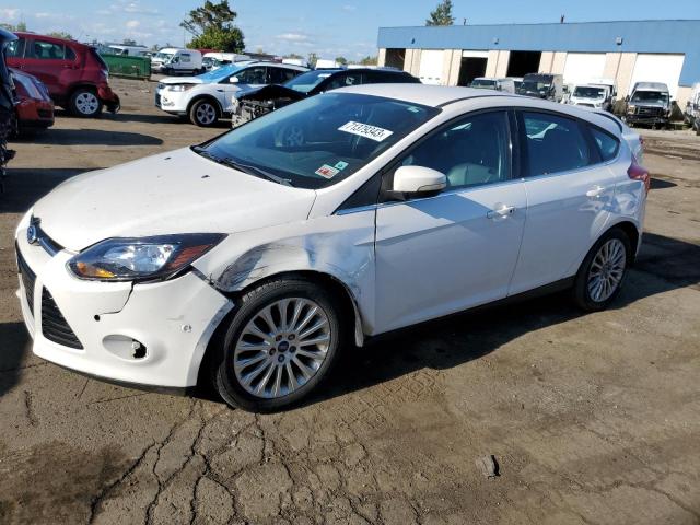 1FAHP3N23CL289300 - 2012 FORD FOCUS TITANIUM WHITE photo 1