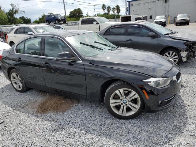 WBA8D9G54JNU71986 - 2018 BMW 330 XI BLACK photo 4