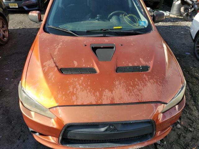 JA3AV66VX9U038884 - 2009 MITSUBISHI LANCER RALLIART ORANGE photo 11