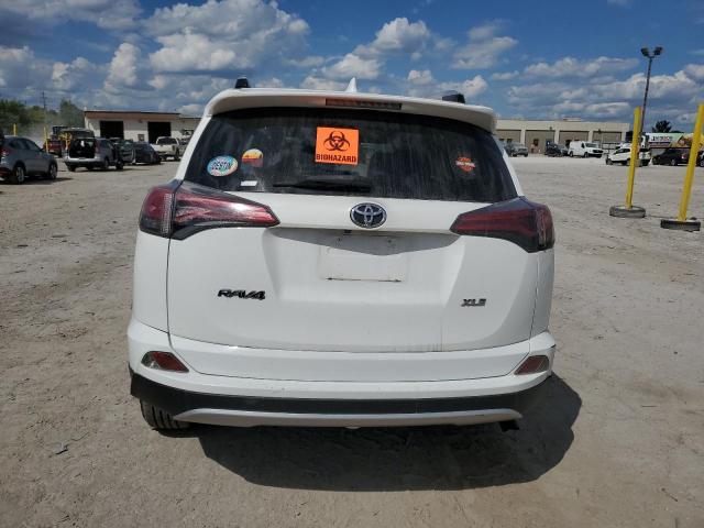JTMWFREV1GD085287 - 2016 TOYOTA RAV4 XLE WHITE photo 6